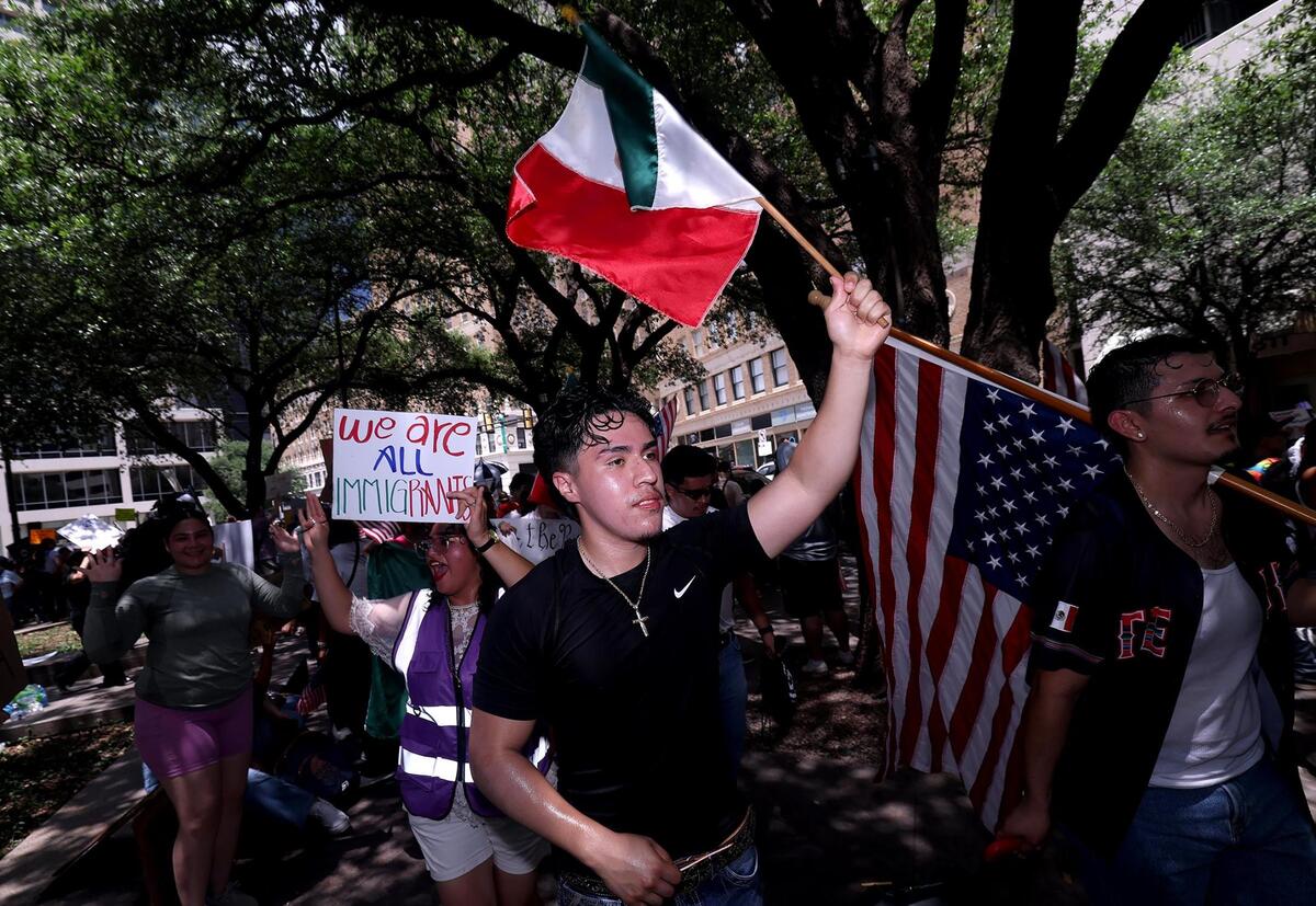 Community members rally during the “No Kings Day” protest in downtown Fort Worth on June 14, 2025.