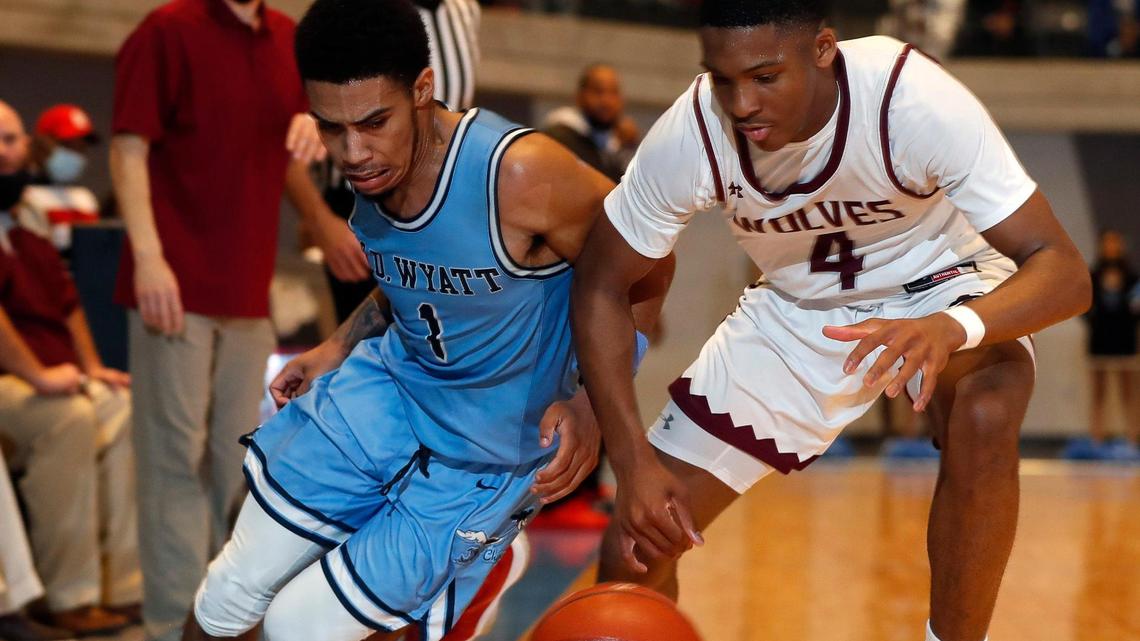 Wyatt guard Jacobi Lewis (1) and Timberview guard Donovan O’Day (4) go for a loose ball during the second half of a Division 5A Region 1 quarterfinal basketball game at Arlington ISD Athletics Complex in Arlington, Texas, Saturday, Feb. 27, 2021. Timberview defeated O.D. Wyatt 57-55. (Special to the Star-Telegram Bob Booth)