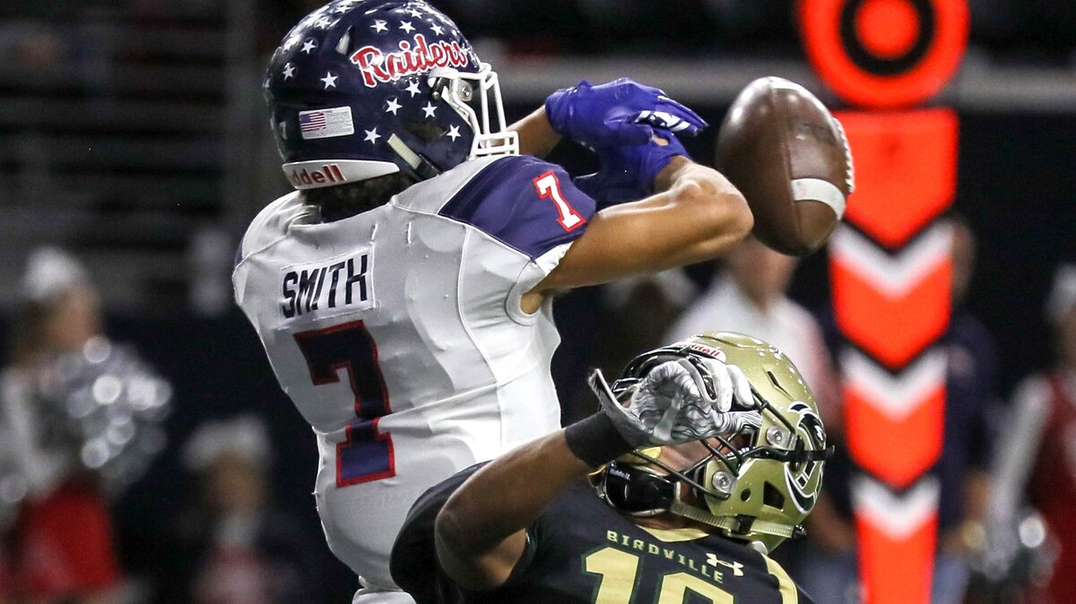 Denton Ryan defensive back Tra Smith (7) defends a pass intended for Birdville wide receiver Carter Self (18) during the second half, Saturday night, December 8, 2018 in the 5A Division I quarterfinal playoff game played at the Ford Center in Frisco, TX.