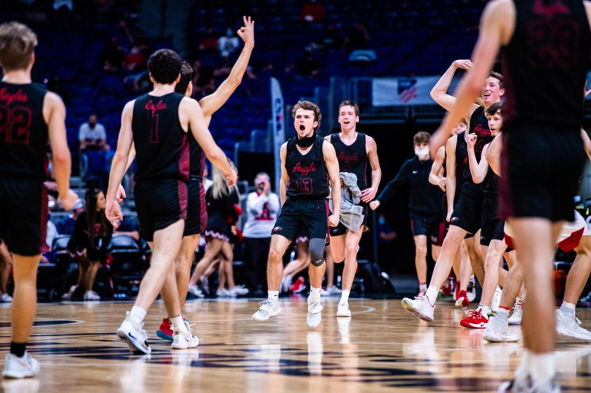 Blake Petter (13) and the Eagles celebrate a three at the end of the 1st during the 4A state final between Argyle and Huffman Hargrave at the Alamodome in San Antonio Texas, on March 13, 2021. Argyle went on to win 49-30. (Photo by Matt Smith. Special to the Star-Telegram).