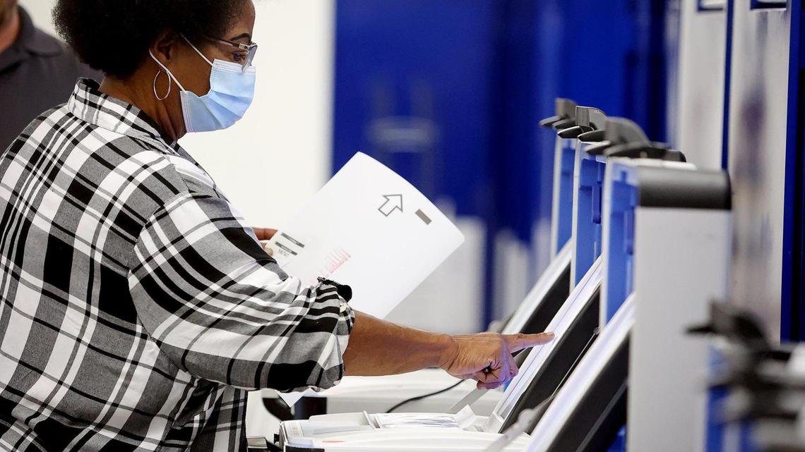 Gwen Johnson fills out a test ballot on Friday at the Tarrant County Elections Administration Office in Fort Worth. The public was invited to test the system and had the opportunity to run in-person and absentee ballots.