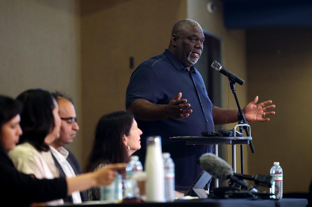 Russell Maryland speaks during a press conference held by Cultural and Racial Equity for Every Dragon and Southlake Anti-Racism Coalition on Tuesday in Southlake. The groups urged Carroll school district to negotiate in good faith after being invited by the U.S. Department of Education’s Office of Civil Rights to negotiate a resolution of four civil rights complaints filed by the groups in 2021.