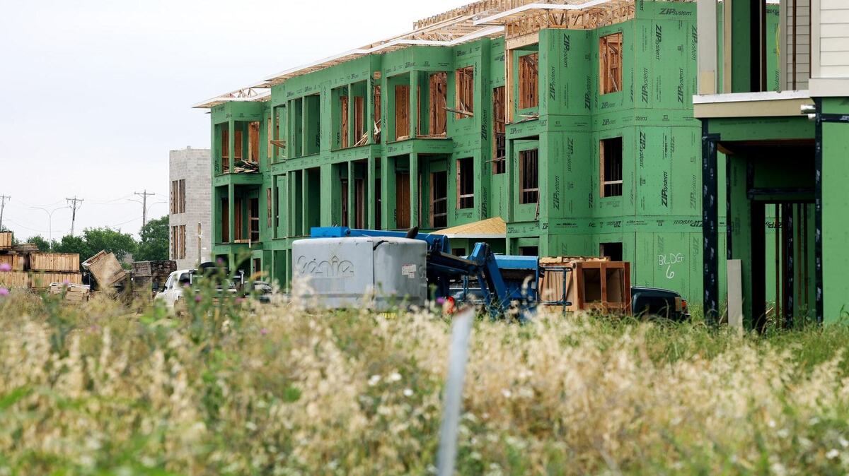 An apartment complex under construction on North Riverside Drive in Fort Worth in May. The Department of Justice has accused a DFW company of unfairly influencing rental prices.