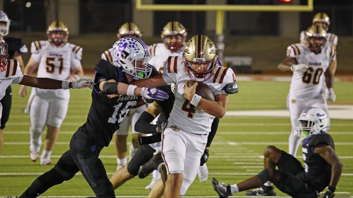 Saginaw running back Elijah Irvin (4) takes the ball up he middle to the one-yard line in their first possession of overtime during the second half of a UIL football game between Saginaw and Paschal at Farrington Field in Fort Worth, Texas, Thursday, October 16, 2025.