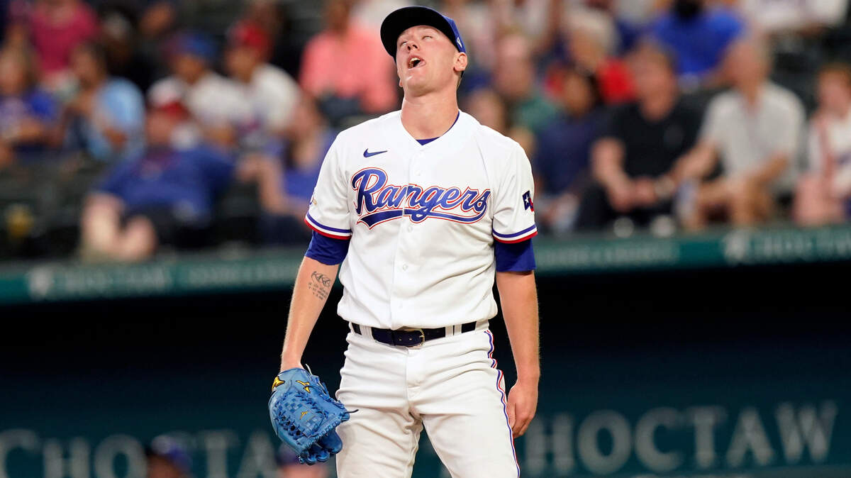 Texas Rangers relief pitcher Kolby Allard reacts after giving up a solo home run to Houston Astros’ Martin Maldonado during the fourth inning Wednesday at Globe Life Field. The Astros won 9-2 to take the final two games of the three-game series.