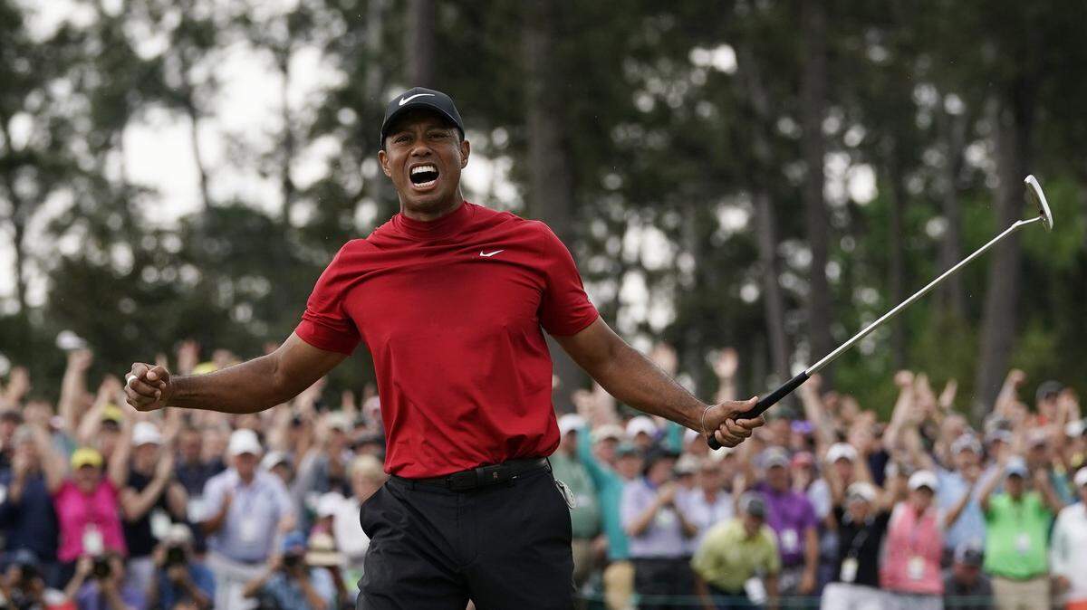 Tiger Woods reacts as he wins the Masters golf tournament Sunday, April 14, 2019, in Augusta, Ga. (AP Photo/David J. Phillip)