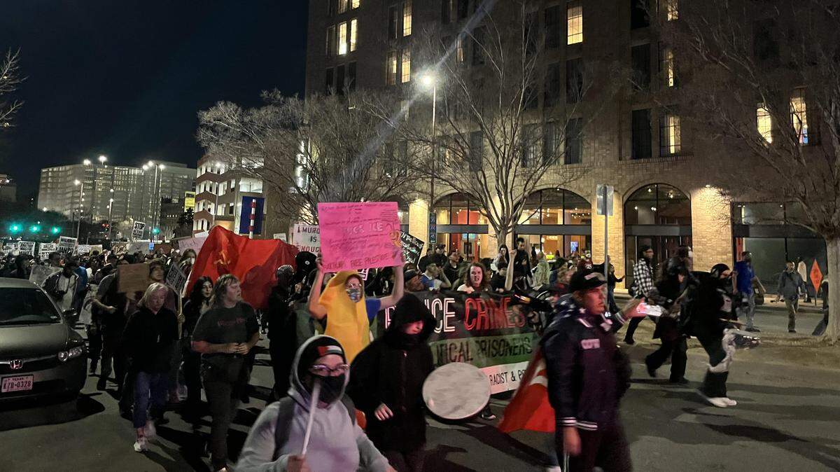 Protestors march in downtown Dallas on Thursday, Jan. 8, 2026, over the death of Renee Good in Minneapolis, who was shot by an immigration agent the day before.