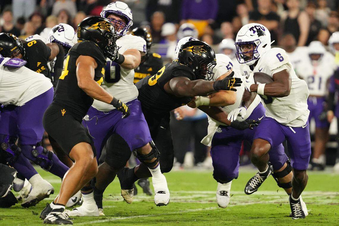Sep 26, 2025; Tempe, Arizona, USA; TCU Horned Frogs running back Trent Battle (6) runs the ball against Arizona State Sun Devils in the first half at Mountain America Stadium, Home of the ASU Sun Devils. Mandatory Credit: Jacob Reiner-Imagn Images