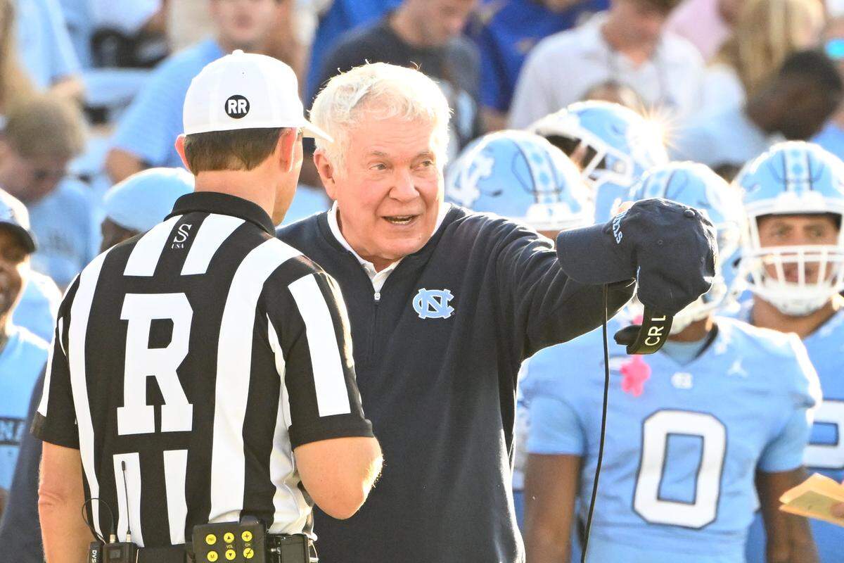 Sep 7, 2024; Chapel Hill, North Carolina, USA; North Carolina Tar Heels head coach Mack Brown with the referee in the third quarter at Kenan Memorial Stadium. Mandatory Credit: Bob Donnan-Imagn Images