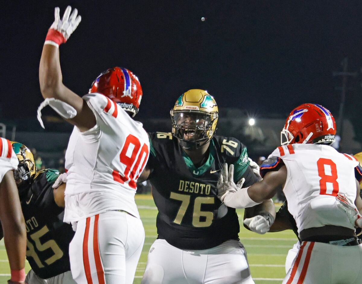 DeSoto offensive lineman Byron Washington (76) plugs up the line on a point after attempt during a District 11 6A football game at Eagle Stadium in DeSoto, Texas, Friday, Oct. 11, 2024.