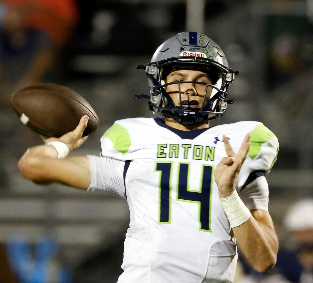 Eaton quarterback Noah Lugo (14) tosses a sideline pass in the second half of a UIL high school football game at Keller ISD Stadium in Keller, Texas, Friday, Sept. 15, 2023. Keller handed Eaton their first loss of the season 36-20. (Special to the Star-Telegram Bob Booth)