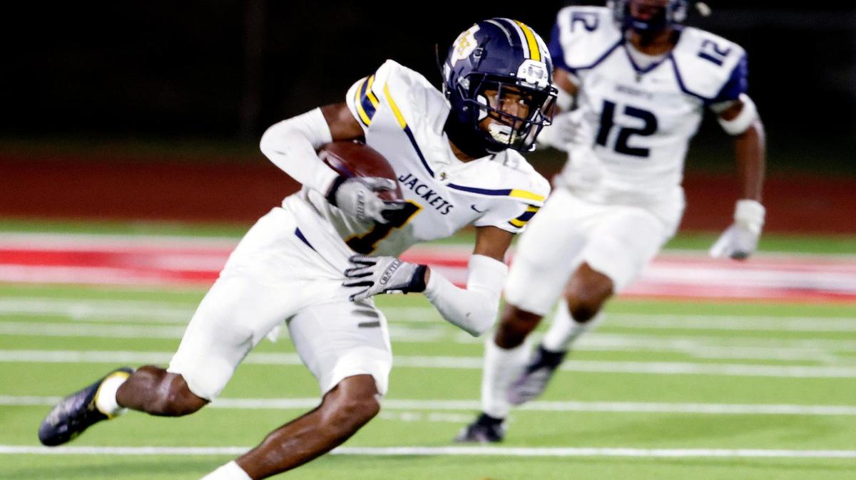 Height’s Keith Guidry intercepts a pass and takes it back for six in the first half of a UIL football game at Clark Stadium in Fort Worth, Texas, Friday, Sept. 29, 2023.