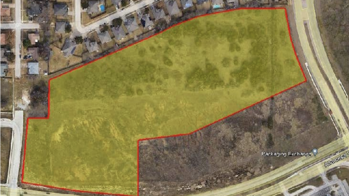 An aerial view of the 16.7 acre site in far south Fort Worth, demarcated in yellow, where developers hope to build a 151-unit rental community.