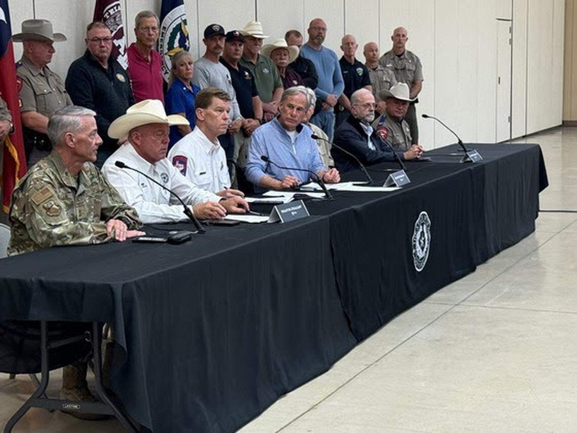 Gov. Greg Abbott and other officials give updates on deadly flooding in Central Texas on Friday, July 4, 2025.