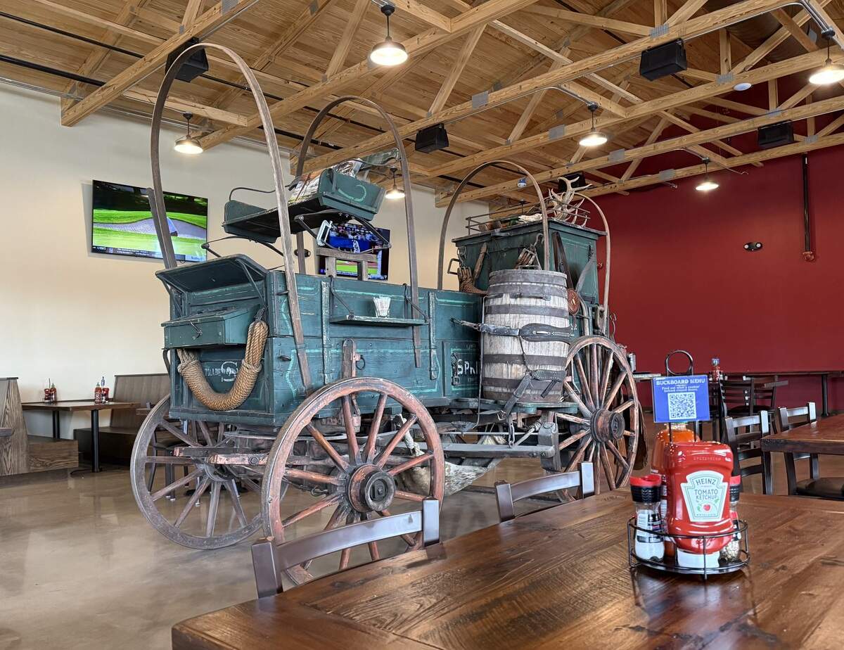 The cavernous interior of the new Fred’s Texas Cafe location in Crowley, Texas, featured a covered wagon in the middle of the dining room, seen Jan. 22, 2026.