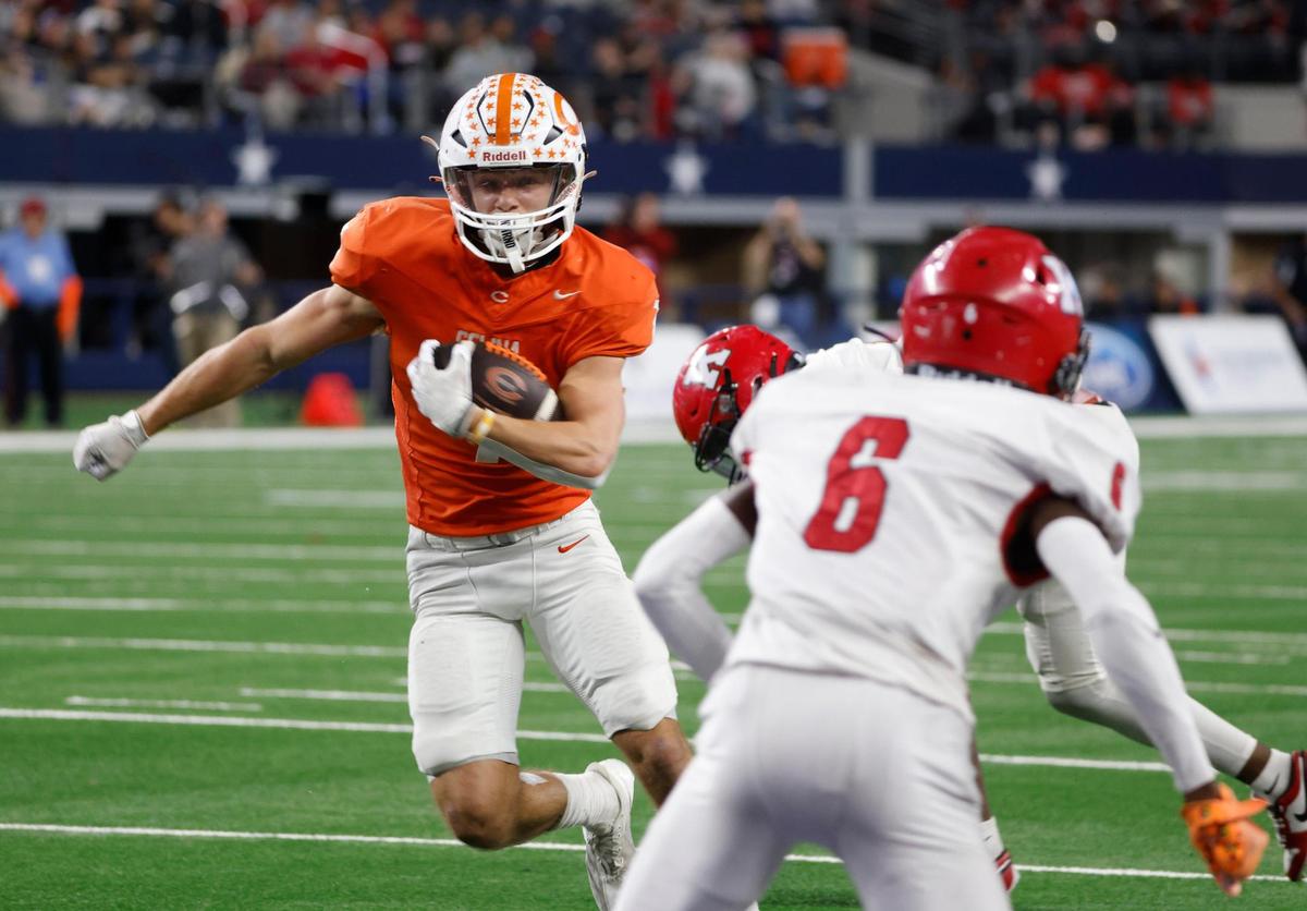 Celina running back Harrison Williams (7) eludes two Kilgore defenders to score during the UIL 4A D1 State Championship football game at AT&T Stadium in Arlington, Texas, Friday, Dec. 20, 2024.