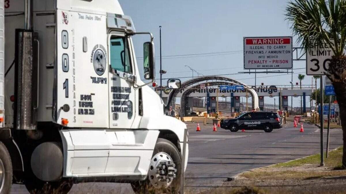 A commercial truck drives by the Pharr-Reynosa International Bridge in Pharr on Monday. Commercial traffic has stopped after Mexican truckers on Monday blocked north- and southbound lanes on the Mexico side of the bridge to protest inspections of commercial vehicles recently ordered by Gov. Greg Abbott.