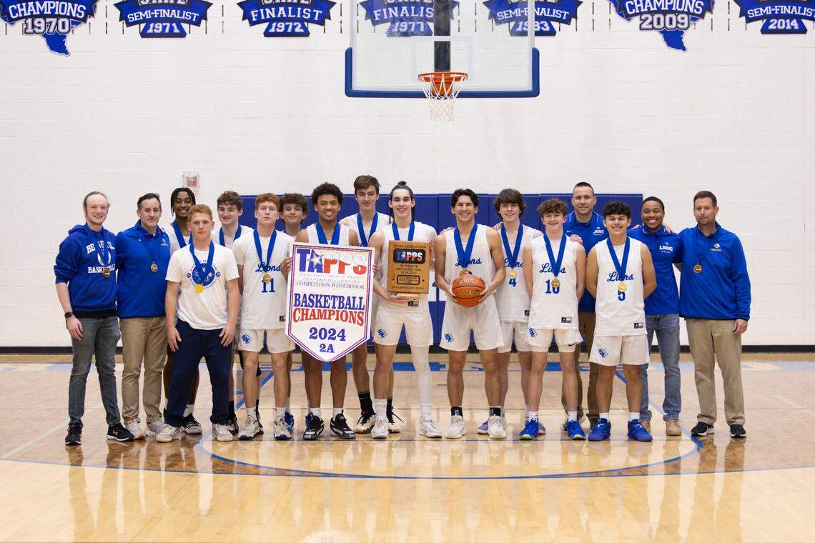 Bethesda Christian poses for a team photo after securing the TAPPS Class 2A boys basketball state title.