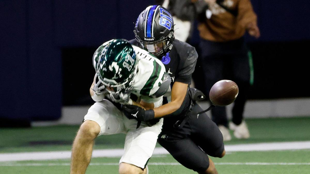 North Crowley linebacker Jonathan Cunningham (14) breaks up a pass intended for Prosper tight end Jack Clifford (17) in the second half of a UIL Class 6A Division 1 football regional-round playoff game at The Ford Center in Frisco, Texas, Saturday, Oct. 25, 2023.