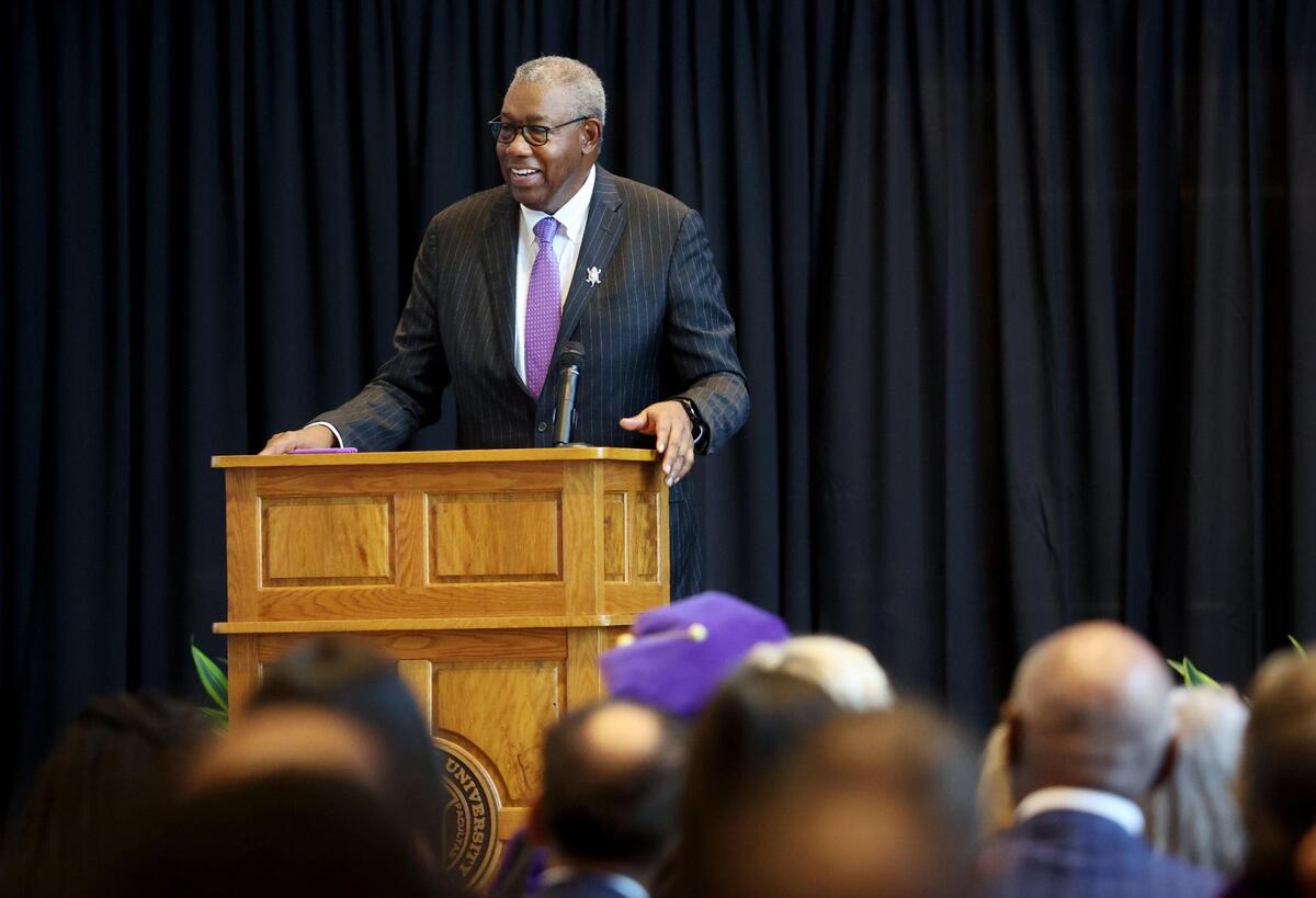 James Cash speaks before a crowd gathered to honor him at TCU on Friday, November 11, 2022. Cash, the first Black student-athlete at TCU, unveiled a statue of himself on display in front of the Schollmaier Arena.