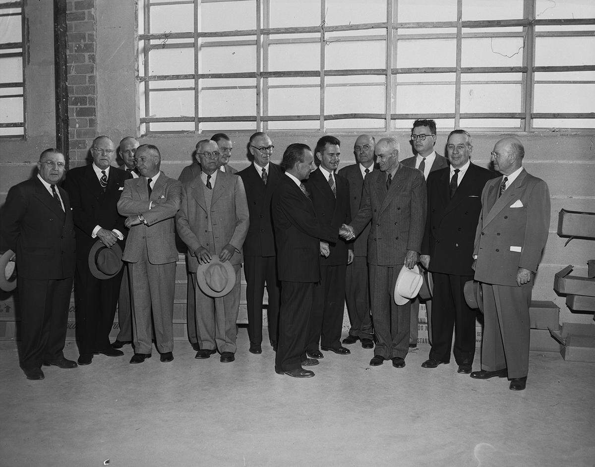 Jan. 24, 1953: Visitors at the Greater Fort Worth International Airport were, from left, Raymond C. Gee, vice chairman of the board of Fort Worth National bank; J. Clyde Jones, president of Waples-Platter Co.; T. J. Harrell, president and general manager of Traders Oil Mill Co.; Web Maddox, president of Crystal Ice Co.; R.L. Hosea, Grove State Bank in Dallas; Harvey Gaylord, vice president in charge of Bell Aircraft Corp., Helicopter Division; Roger Ringo, controller of the General Motors plant at Arlington; Maury H. Huffman, executive director of Fort Worth Air Terminal (shaking hands with Ernest Petteway, retired American Airlines pilot of 18 years); B.A. Erickson, manager of flight and chief test pilot at Convair; J.B. Thomas, president/general manager of Texas Electric Service Co.; Loyd Turner, special assistant to Convair’s division manager at Fort Worth; Raymond Buck, attorney and counsel for the terminal corporation; and William Holden, executive vice president of the Fort Worth Chamber of Commerce.