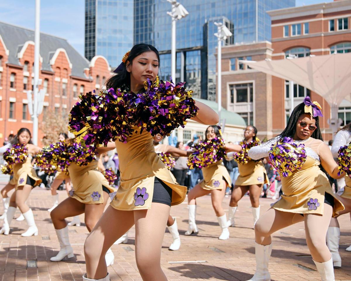 The Everman High School dance team performs in Sundance Square Plaza during the 2024 MLK parade and rally in downtown Fort Worth on Monday.