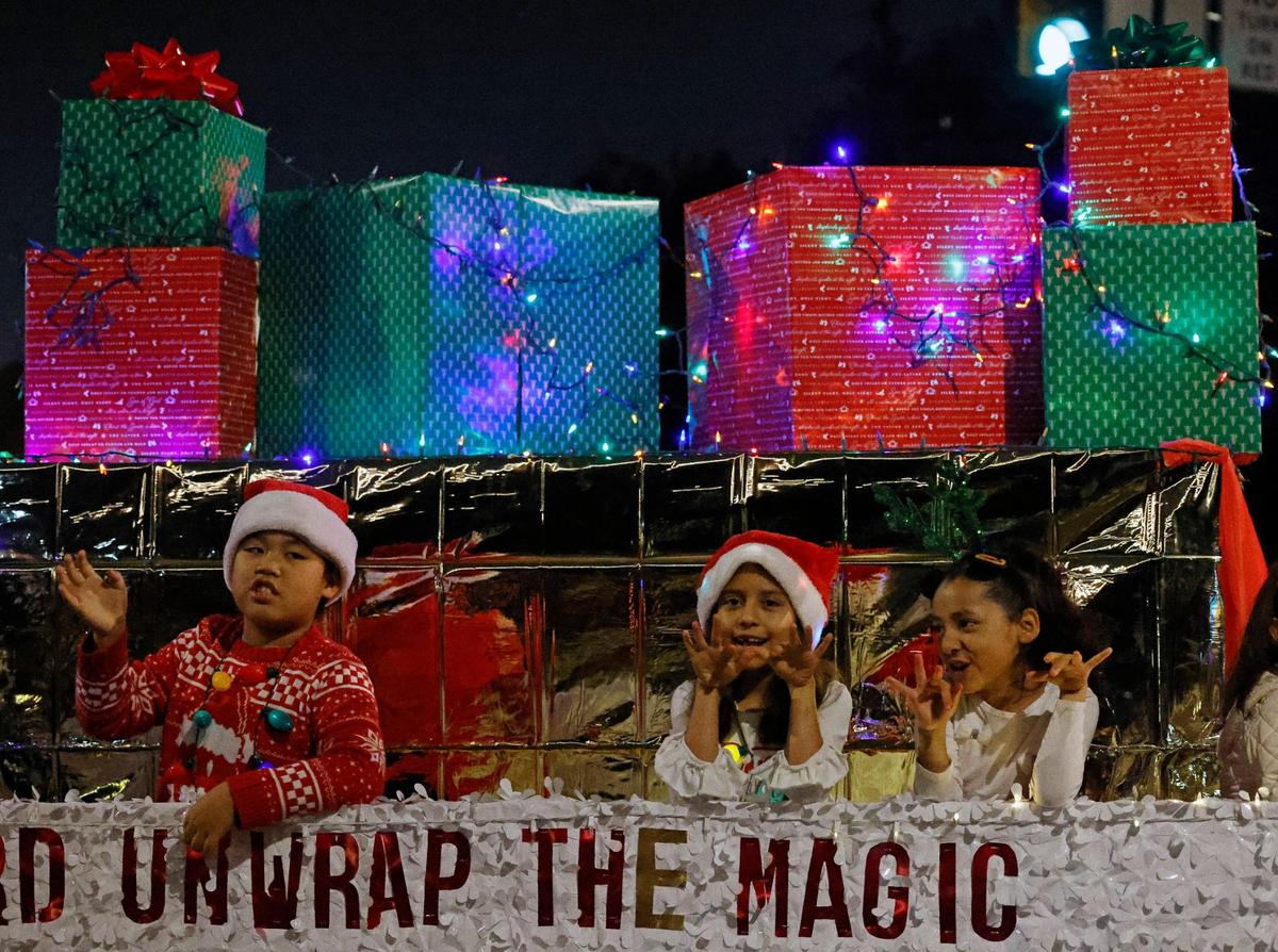 A float’s message read “Let his word unwrap the magic of Chirstmas,” at the 2023 GM Financial Parade of Lights.