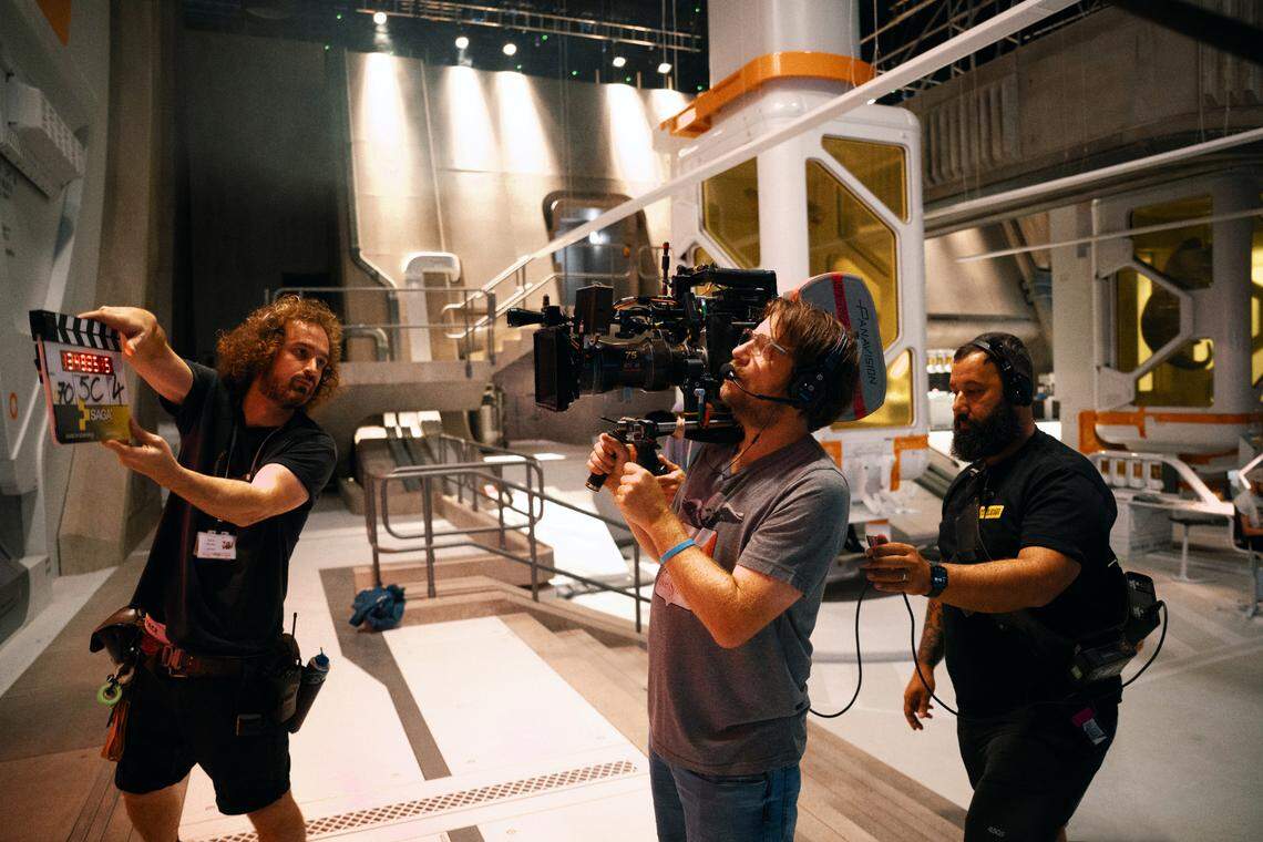 Director Gareth Edwards (center) on the set of “Jurassic World Rebirth.”