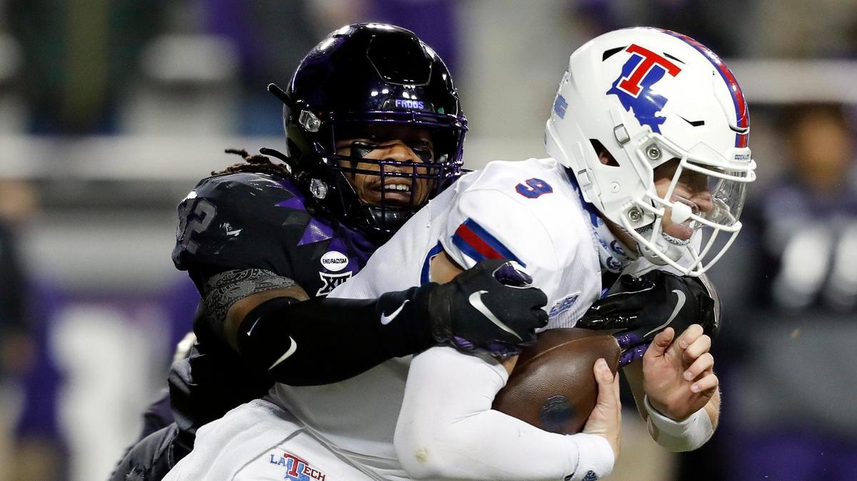 TCU defensive end Ochaun Mathis, left, in action last season against Louisiana Tech, finished with nine sacks in 2020. He has one sack so far this season but hopes to finish strong as he did last year.