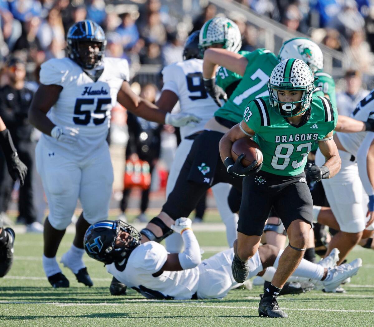 Southlake running back Christian Glenn (83) heads up field for a long gain during the UIL District 6A D2 Regional Semi-Finals football game at Joy and Ralph Ellis Stadium in Irving, Texas, on Friday, Nov. 29, 2024.