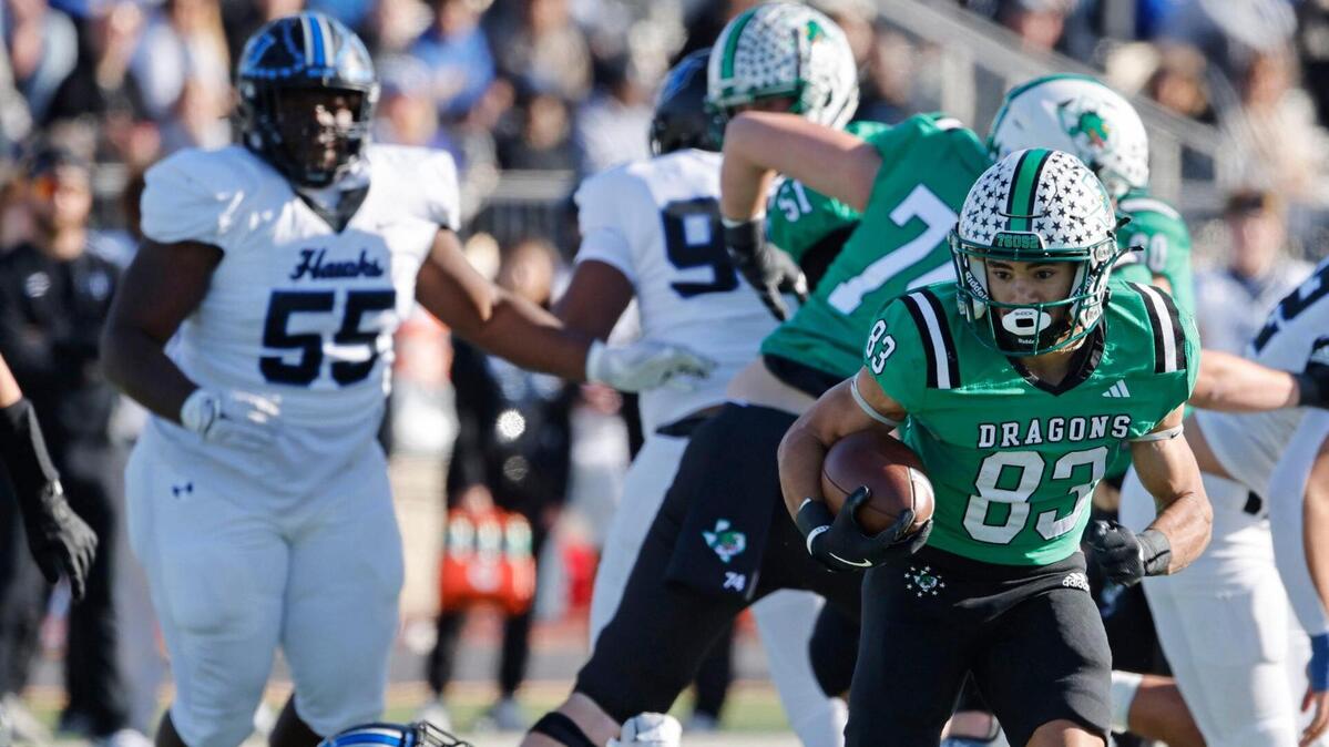Southlake running back Christian Glenn (83) heads up field for a long gain during the UIL District 6A D2 Regional Semi-Finals football game at Joy and Ralph Ellis Stadium in Irving, Texas, on Friday, Nov. 29, 2024.