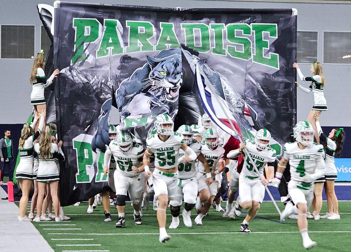 The Paradise Panthers take the field before the start of their Class 3A Division 1 state semifinal against top-ranked Malakoff on Thursday, Dec. 12, 2024 at the Ford Center in Frisco, Texas. Malakoff rallied for 20 fourth-quarter points to oust Paradise 27-19.
