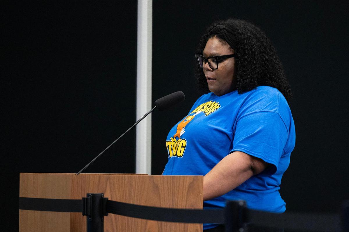 Danyelle Liggins, a fourth-grade teacher at De Zavala Elementary, speaks during the public comment portion of the FWISD School Board meeting at the District Administration Building on Tuesday.