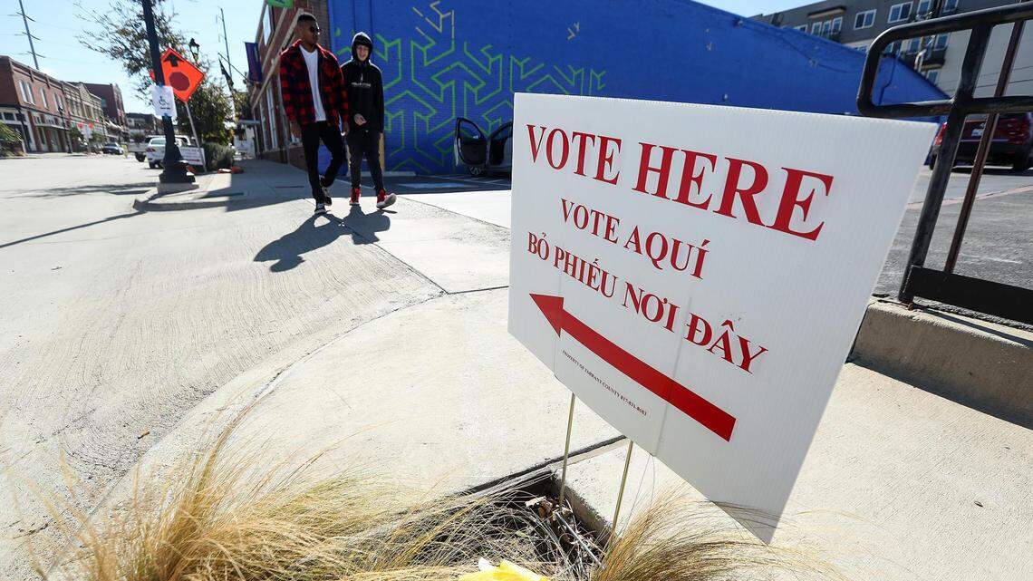 A sign directs voters to the polling site at Amphibian Stage on South Main Street in Fort Worth on Nov. 3. Runoff elections were Tuesday.