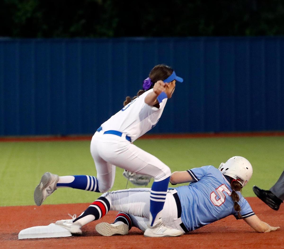 Brewer second baseman Mia Serrato (3) makes the play on Richland’s Gracyn Slack (5) during a 5A Region I Bi-District softball playoff game at Brewer High School in White Settlement, Texas, Friday, April 30, 2022. Richland defeated Brewer 12-3 to move on to the next round. (Special to the Star-Telegram Bob Booth)