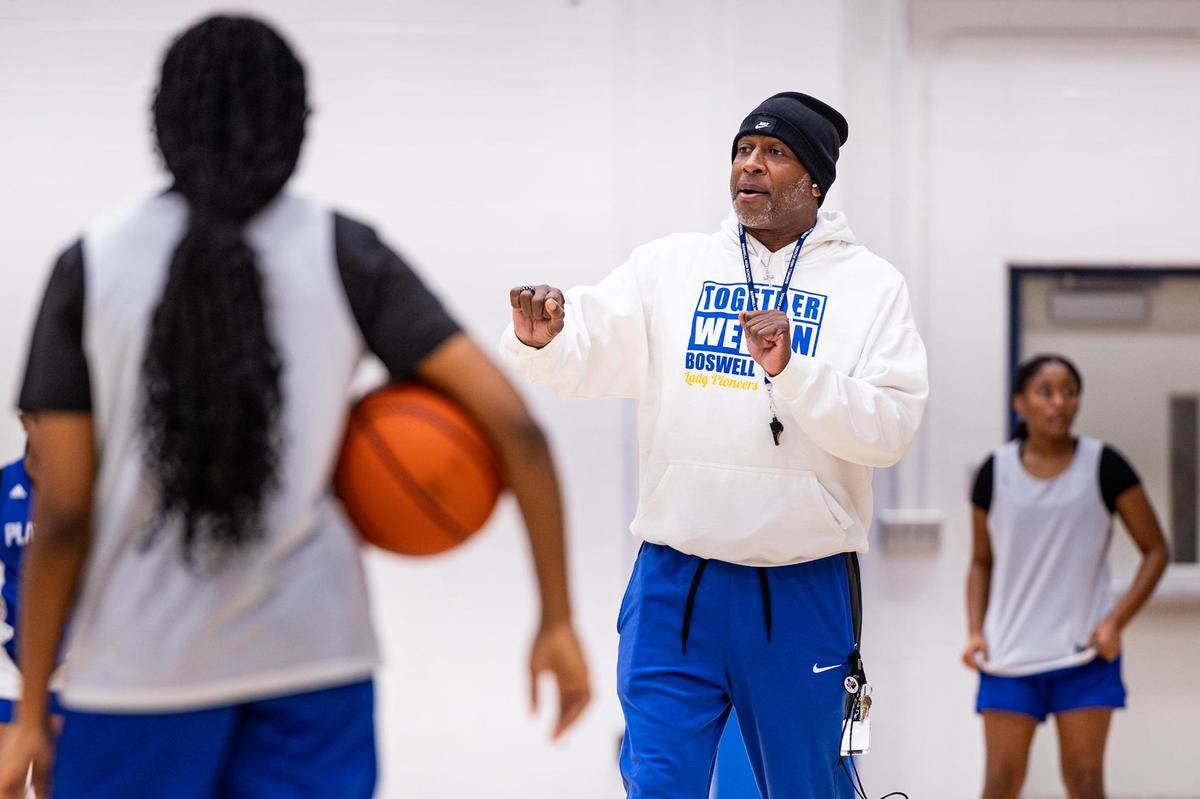 Boswell Head Coach John Reese coaches his players during a scrimmage in practice at the Boswell High School gymnasium in Fort Worth on Wednesday, Jan. 29, 2025.
