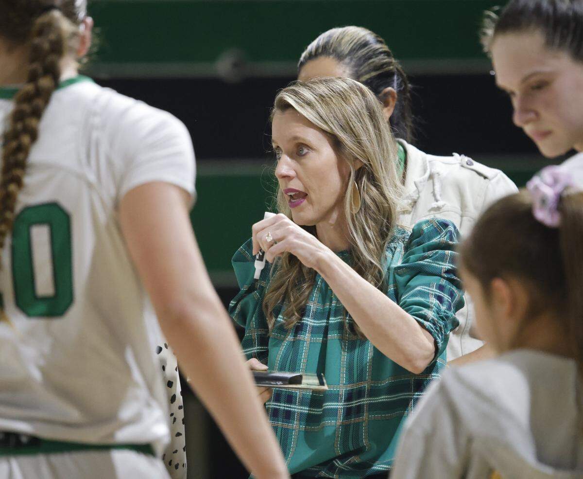 Southlake head coach Robyn McCoart talks to the team during a timeout against L.D. Bell in  the second half of a UIL girls basketball game between L.D. Bell and Southlake Carroll at Southlake Senior High School in Southlake, Texas, Tuesday Feb. 03, 2026