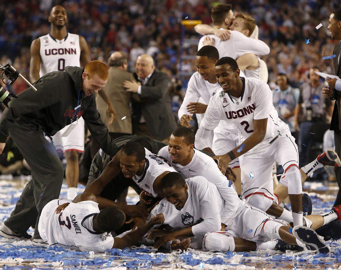 Connecticut players celebrate after beating Kentucky in the 2014 NCAA National Championship game at AT&T Stadium in Arlington. UCONN was a No. 7 seed and Kentucky was an eight seed.