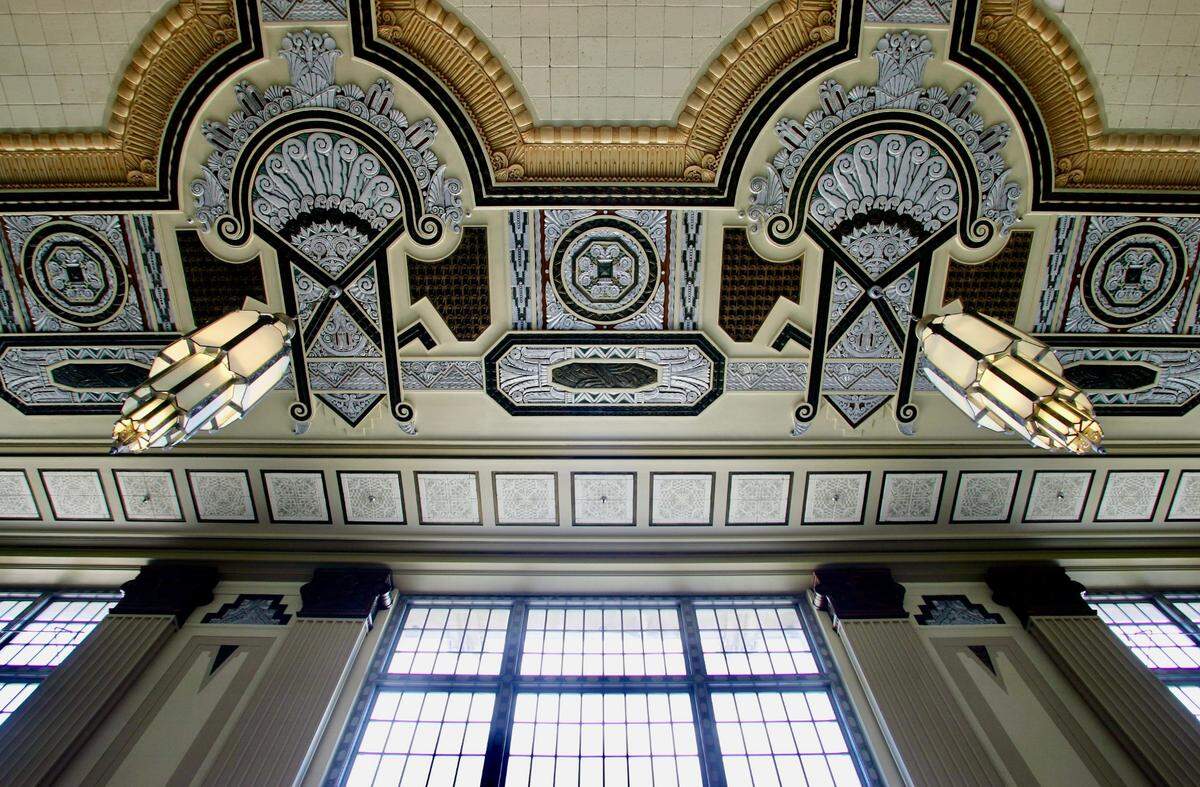 Large and detailed light fixtures along with detailed ceiling work inside the main entrance of the former Texas & Pacific Railway Terminal Main Waiting Room in Fort Worth (”T&P Station”), now Texas and Pacific Lofts, as seen April 14, 2006.