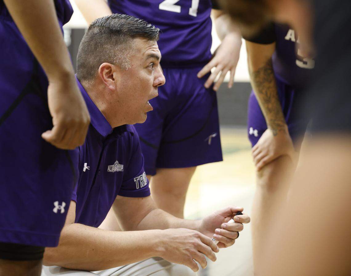 Alvarado head coach Francisco Islas talks to the team during a timeout in the first half of a UIL boys basketball game between Alvarado and Kennedale at Kennedale High School in Kennedale, Texas, Tuesday Jan. 13, 2026