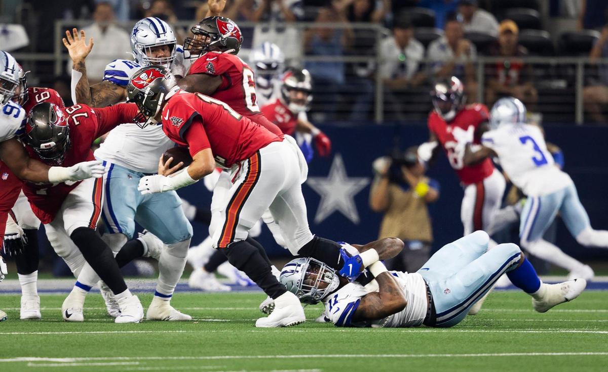 Dallas Cowboys linebacker Micah Parsons sacks Tampa Bay Buccaneers quarterback Tom Brady during the 2022 season opener against on Sunday, September 11, 2022, at AT&T Stadium in Arlington.