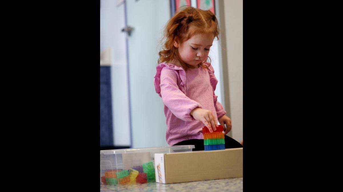 Meryle, 2, plays with blocks while being cared for at Kids’ Place Child Development Center on Jan. 15, 2025, in Fort Worth.