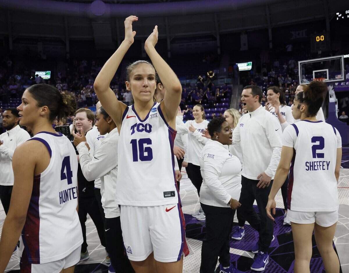 TCU guard Clara Bielefeld (16) celebrates with fans after defeating Washington to move on to the Sweet 16 at Schollmeier Arena in Fort Worth, Texas, Sunday, March, 22, 2026.