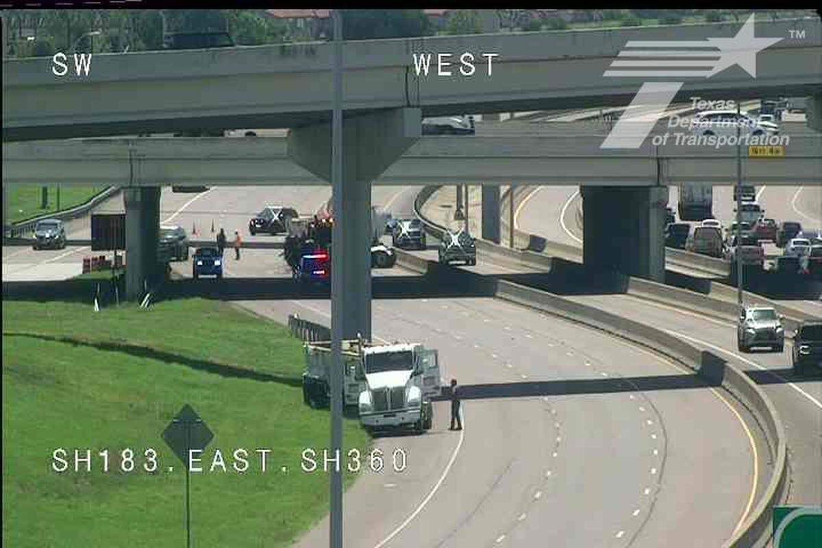 A crash on eastbound Texas 183 at Texas 360 near DFW Airport blocks lanes of traffic on Monday afternoon, June 16.
