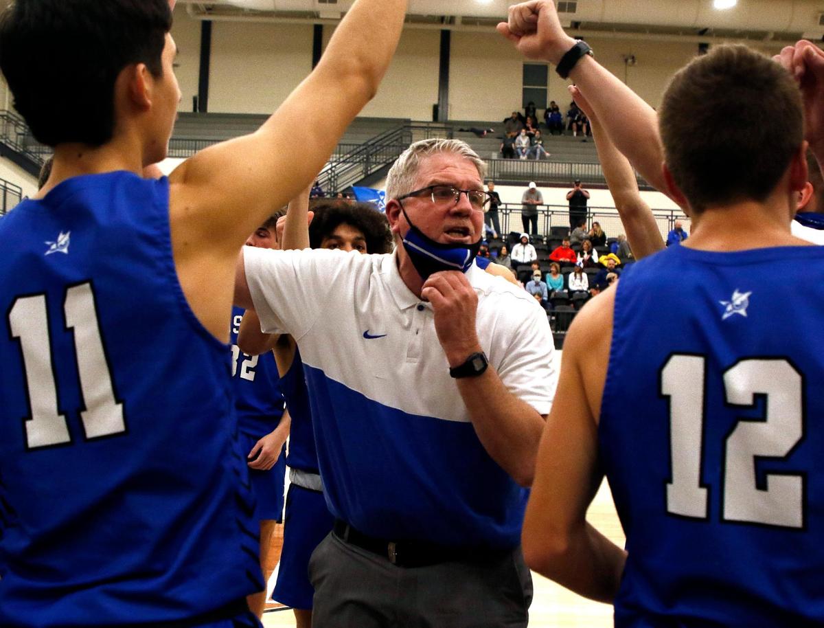 Joshua head coach Brandt Lockhart talks to the team during a timeout in the second half of a 14-5A high school basketball game at Cleburne High School in Cleburne, Texas, Tuesday, Feb. 09, 2021. Joshua defeated Cleburne 68-50. (Special to the Star-Telegram Bob Booth)