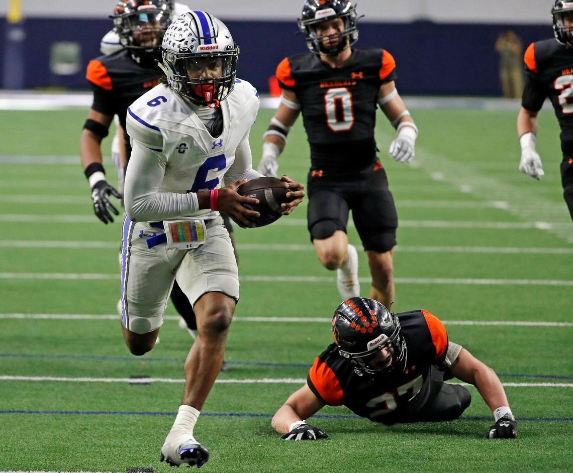Burleson Centennial quarterback Phillip Hamilton (6) takes off on a long run in the first half of a UIL Class 5A D1 state quarterfinal football game at the Ford Center in Frisco, Texas, Friday, Dec. 02, 2022. Aledo led 21-14 at the half.(Special to the Star-Telegram Bob Booth)