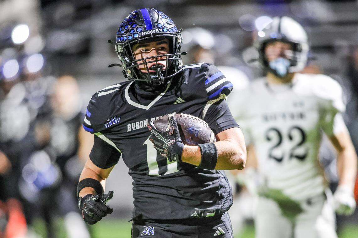 Byron Nelson receiver Nolan Hawkins scores a touchdown to tie Denton Guyer at 21 in the fourth quarter Friday.