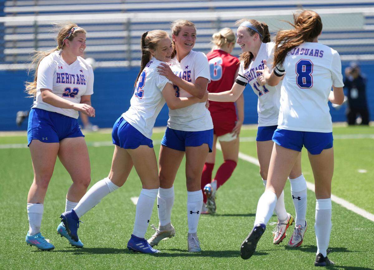 Midlothian Heritage celebrates a goal during its 4-1 win over Lumberton in the state semifinals on Wednesday April 13, 2022 (Ken Murphy/MaxPreps)
