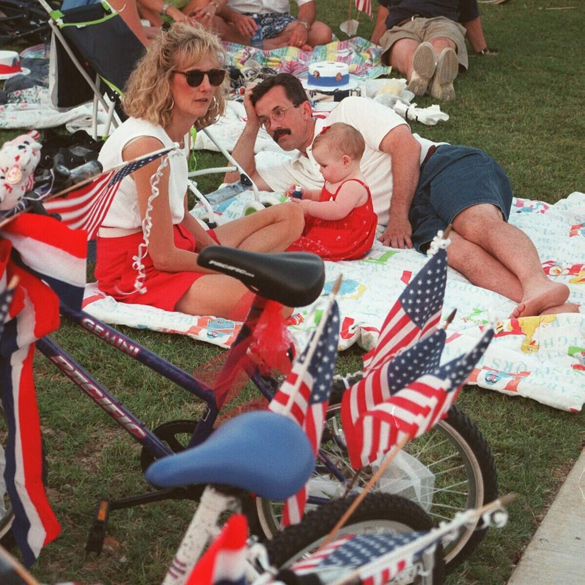 June 26, 1999: Southlake Parks and Recreation held the 'Stars and Stripes Celebration' at Town Square. Bruce and Nanaa Wancata with their baby, Madison.