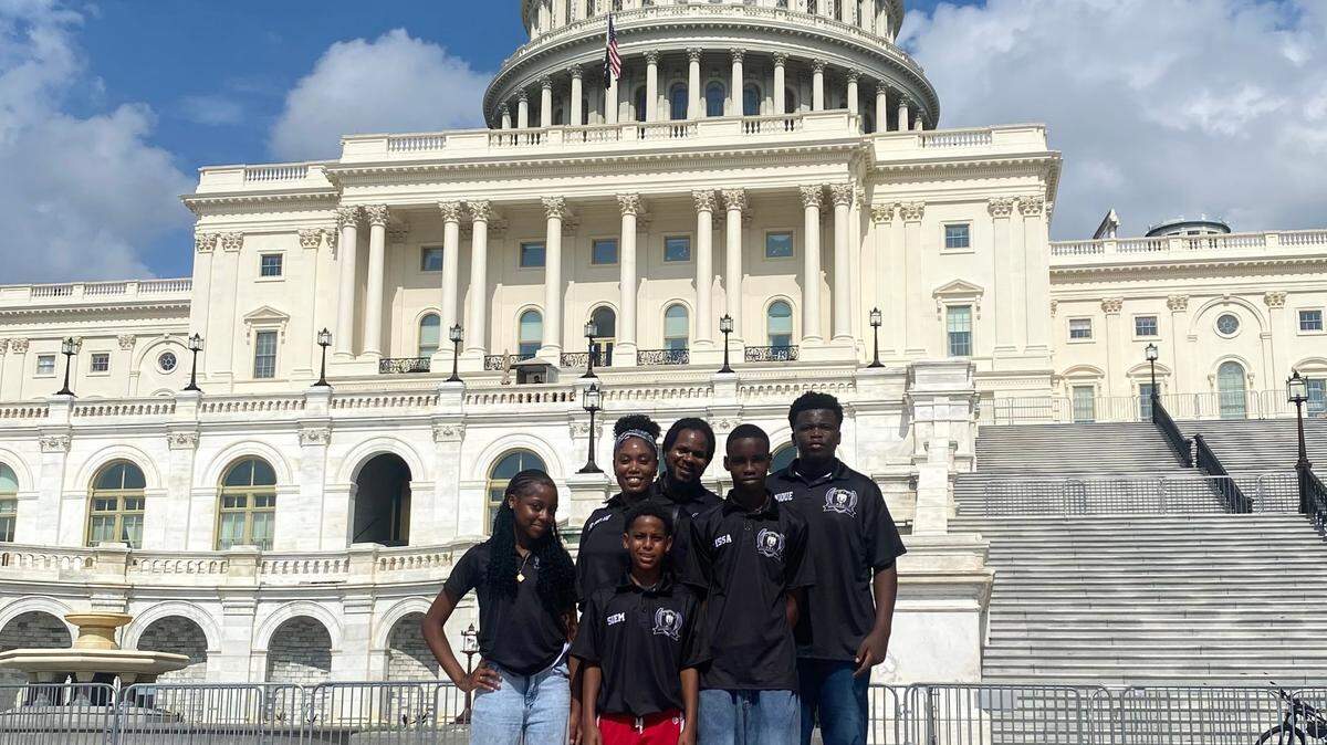Front row from left are Masoka Peter, Siem Ghebrelibanos and Mouhannad Issa. Back row from left are LaTasha Ireland, Kenneth Ireland and Dominique Lusambya. Peter, Ghebrelibanos, Issa and Lusambya were among 300 young people from across the country who attended the National PAL Youth Leadership and Mentor Summit this month in Arlington, Virginia. They also visited Washington, D.C.